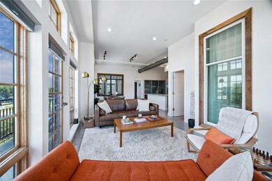 Living room with plenty of natural light and rece