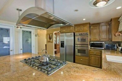 REMODELED KITCHEN WITH GRANITE COUNTER TOPS, STAIN