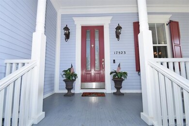 Inviting front porch and welcoming front door.