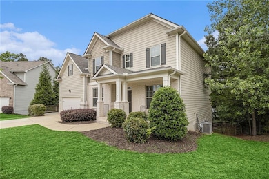 View of front facade featuring covered porch, an a