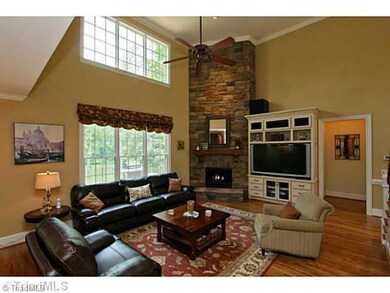 Den/Family/Great Room. This open floor plan is great for entertaining or raising a family!  Every window you see has a spectacular view of the lake!