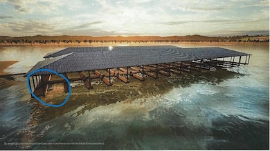 Dock area featuring a water and mountain view
