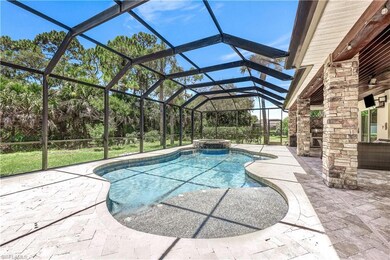 View of swimming pool with glass enclosure, an in 