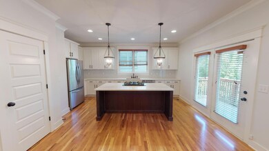 This kitchen has great natural light and has a great view into the nearby living area