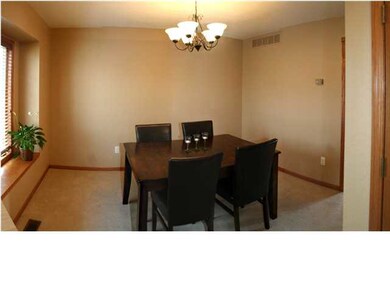 Formal Dining Room right off the Kitchen with wind