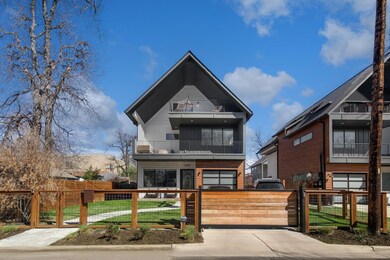 View of front facade with a fenced front yard, a 