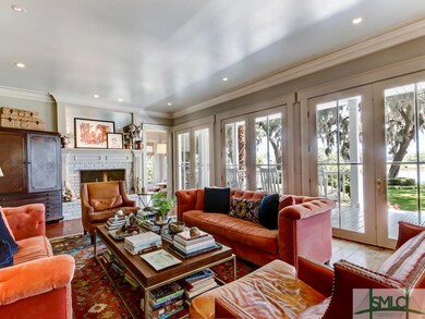 French doors across the back of the home open to t