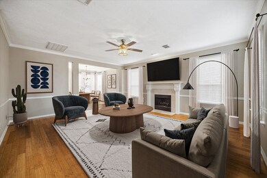 Bright and welcoming, the living room is situated