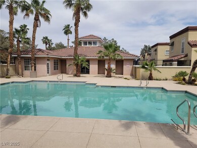Community pool with a patio area