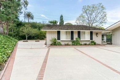 Lots of room beyond driveway, possibly build a new