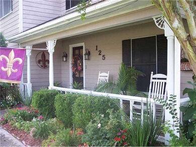 Exterior Front. VERY PRETTY FRONT YARD