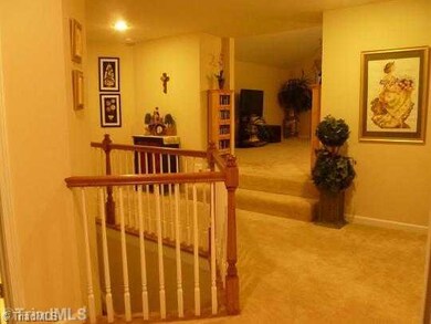 Other. Upper level hallway showing a 2-step elevated entrance to the 17 10