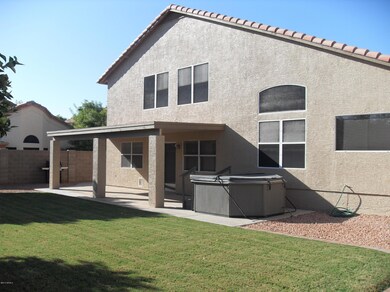 Covered Patio & Spa in Back Yard