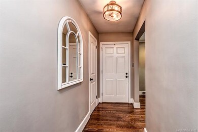 Hallway view looking towards front door entry. Liv