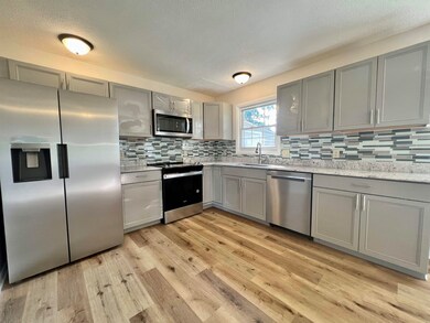 All new cabinets, stainless steel appliances, gran