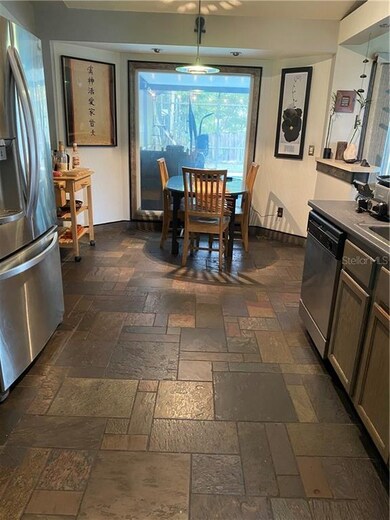 Kitchen-nook area with custom glass panel