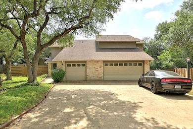 View of front of home with roof with shingles, co