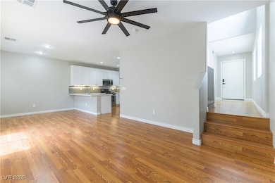 Unfurnished living room featuring light wood-type