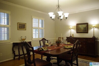 Hardwoods throughout main level.  Plantation shutt