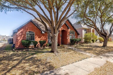 View of front of property featuring brick siding a