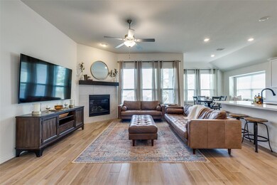 Living room featuring light hardwood / wood-style 