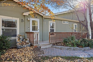 Doorway to property with a deck