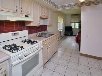 The Fully-Equipped Updated Kitchen Features Tile B