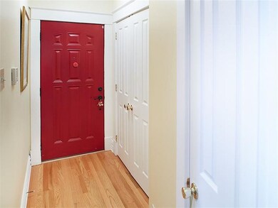 Entry Hall. Guest coat closet on the right and fur