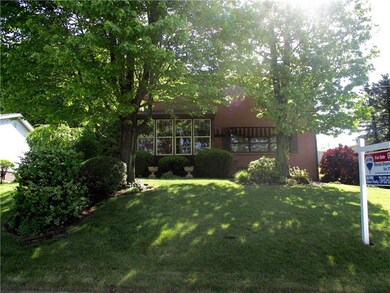 Enclosed front porch...what a nice feature!