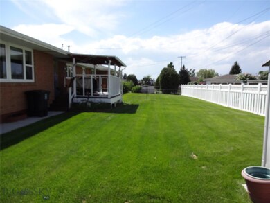 fenced back yard