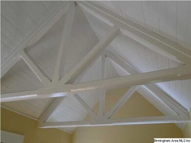 original Tuss beamed ceiling in living room