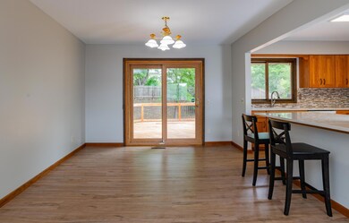 Dining room opens to HUGE deck with retractible awning.jpg