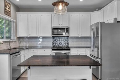 Stunning freshly painted updated kitchen with new 