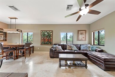 OPEN FLOOR PLAN WITH IMPACT WINDOWS AND DOORS.. ALSO HAS GENERATOR THAT RUNS PROPERTY IN EVENT OF POWER FAILURE