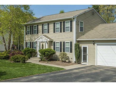 Exterior Front. New vinyl siding, new windows, and