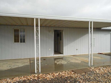 BACK DOOR AND COVERED PORCH