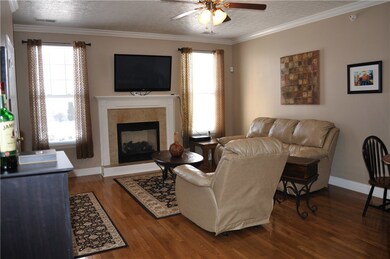 Living Room w/Hardwood Floors, Crown Moldings, Gas