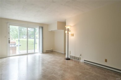 Central Family Room with laminate floors (2012) wi