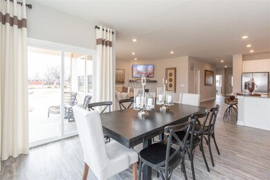 Dining room is large enough to fit a large dining 