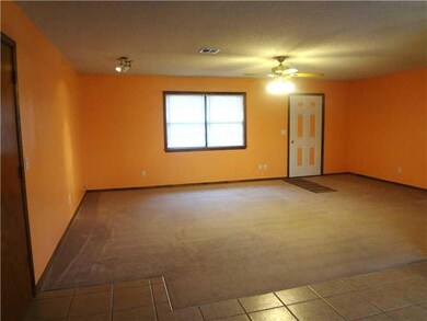 Living Room. Living room and front door.