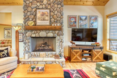 Floor To Ceiling Stone Fireplace