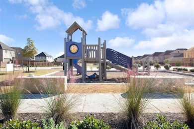 Community jungle gym featuring residential view