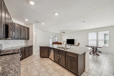 Large open kitchen that leads out to the family ro