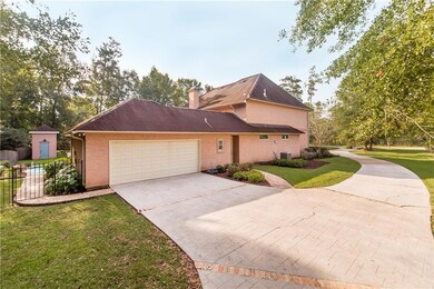 Side load garage with fenced rear pool access