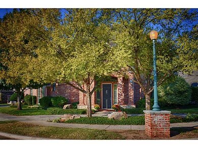 Exterior Front. Great curb appeal with mature tree