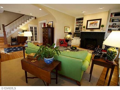 Living Room - With gas fireplace and custom shelving