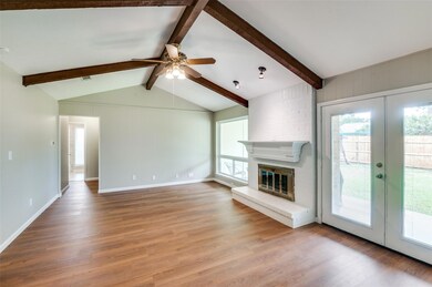 Relax in your spacious living room by the wood burning fireplace