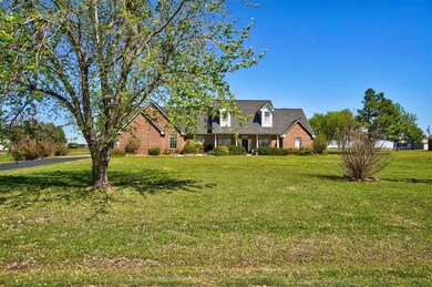 Gorgeous view of the front lawn and home.