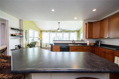 The Chef's kitchen has beautiful shaker cabinetry,