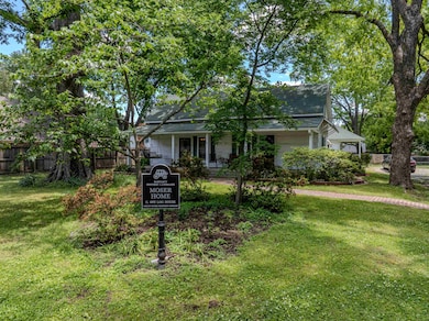 View of property hidden behind natural elements wi